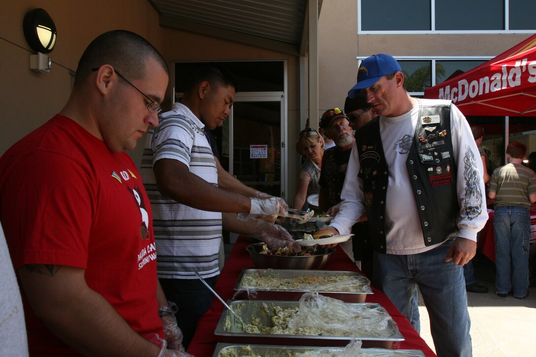 More than 20 Marines participated in a volunteer event at the Ronald McDonald House of San Diego Aug. 9. The Marines helped set up, serve food and clean up the event. The Ronald McDonald House is an organization that gives families a place to stay while their children are in the hospital.