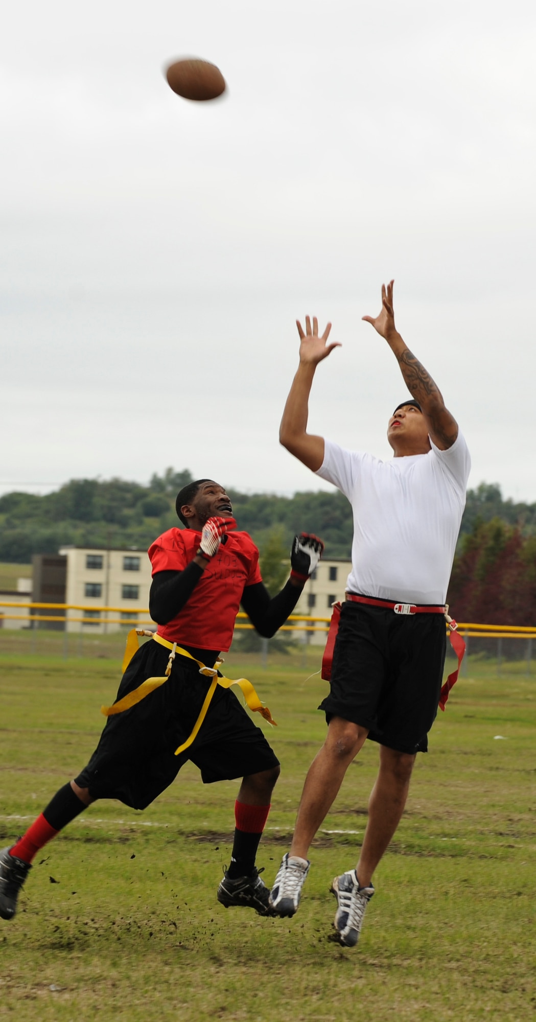 ELMENDORF AIR FORCE BASE, Alaska -- Suwada Humphrey looks in a touchdown pass for the 3rd Logistics Readiness Squadron team during the intramural flag football game Aug. 6. This was the season's first football game. The 3rd LRS team beat the 703rd Aircraft Maintenance Squadron team 27-14. Humphrey is a technical sergeant with the 3rd LRS team. (U.S. Air Force photo/Senior Airman David Carbajal)