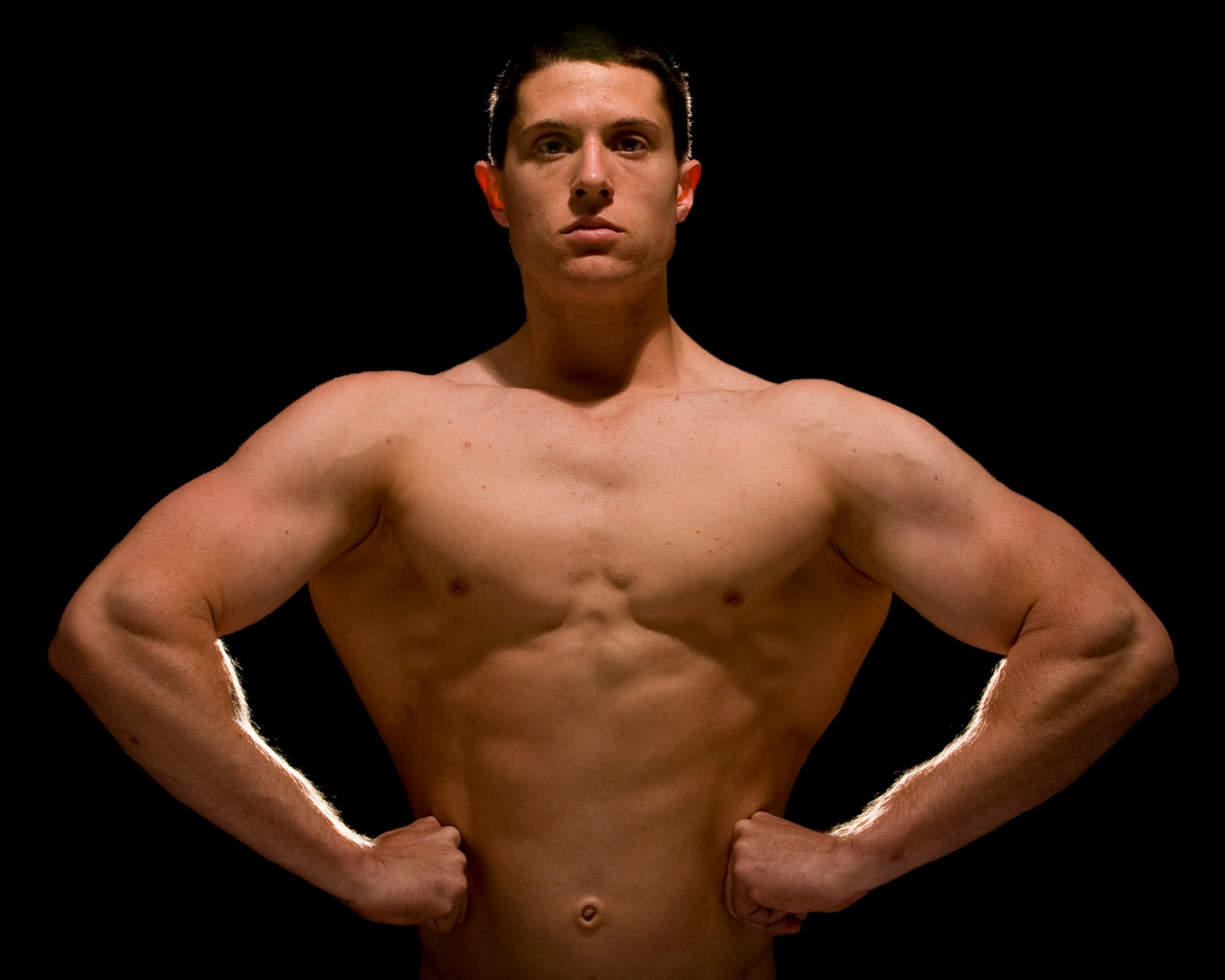 Airman 1st Class Ryan Timm, 62nd Logistics Readiness Squadron, trains at the base fitness center weight room. Airman Timm competed in a local bodybuilding competition in August. (U.S. Air Force Photo/Abner Guzman)