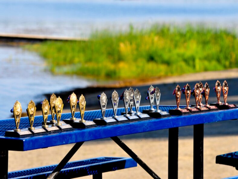 Medical Lake, Wash. – Gold, silver and bronze medallions are awarded to athletes at the end of the Clear Lake Triathlon in Medical Lake, Wash., July 25. (U.S. Air Force photo / Airman 1st Class Melissa L. Carlino)