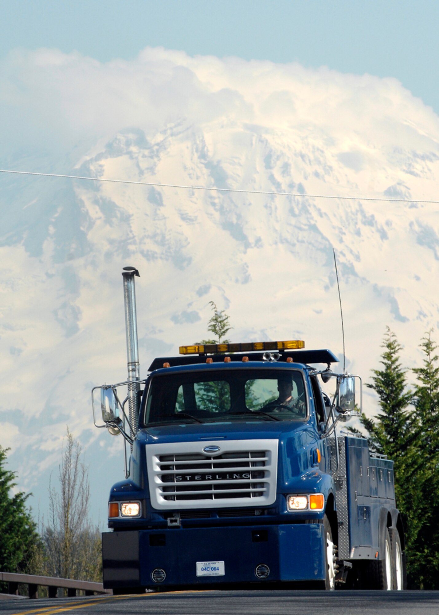 A 62nd LRS Airman drives one of the many vehicles the squadron uses to transport mission-essential parts and supplies. (U.S. Air Force photo/Abner Guzman)(Released)