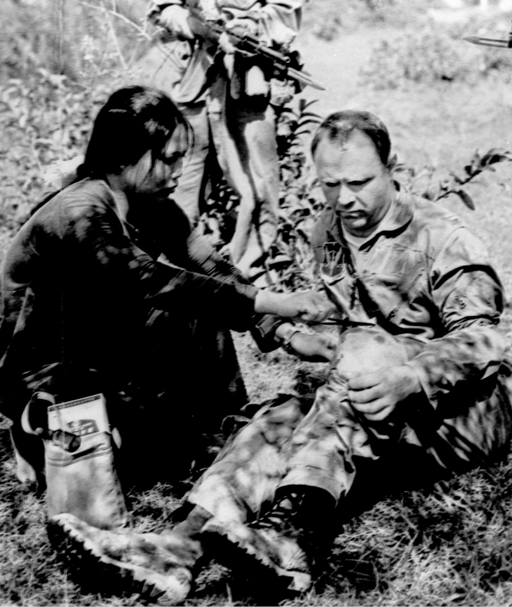 North Vietnamese propaganda photo of downed U.S. airman receiving first aid. (U.S. Air Force photo)