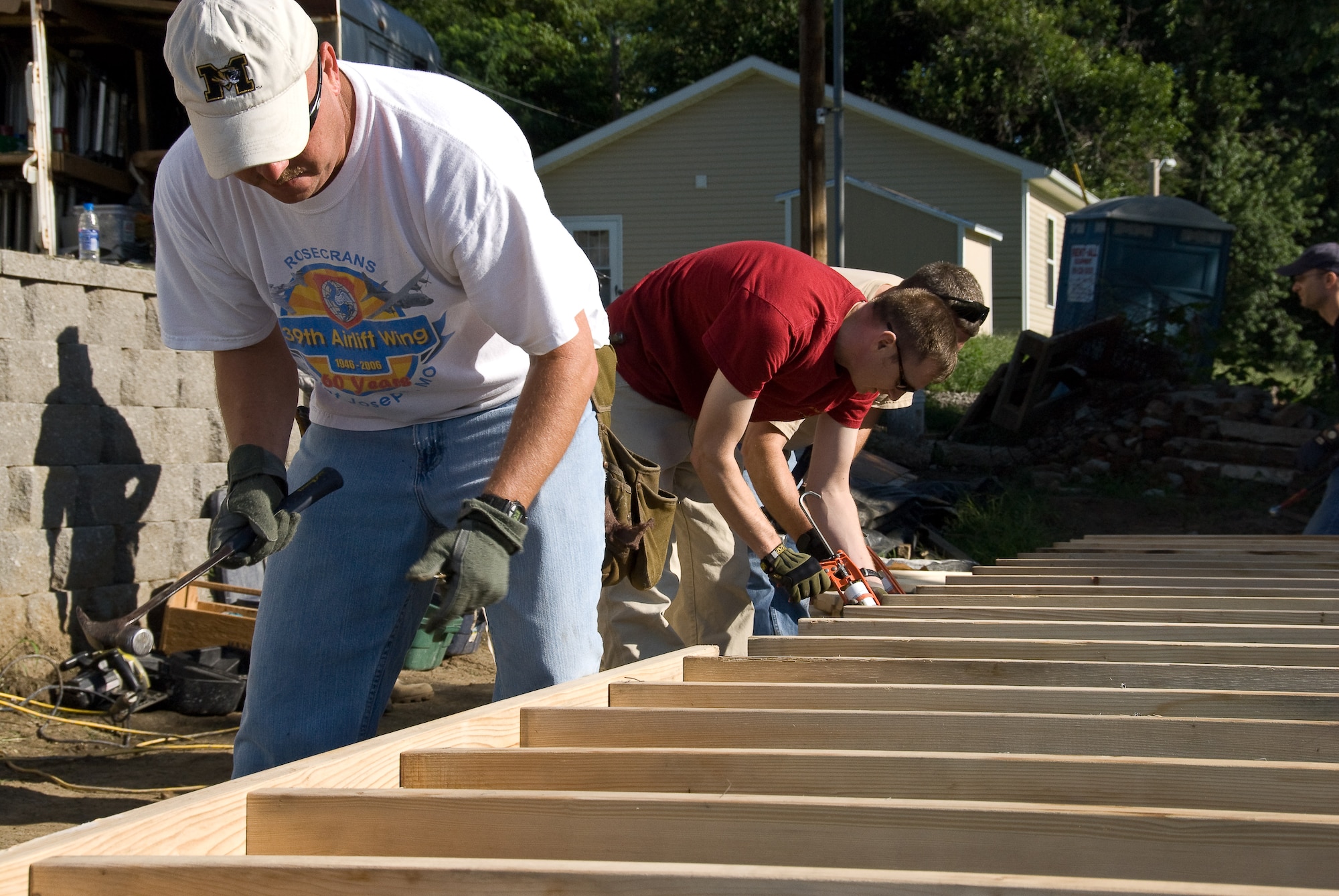 139th Airlift Wing members volunteer during a house construction project on July 18, for the Habitat for Humanity project in St. Joseph.  (U.S. Air Force photo by Master Sgt. Shannon Bond) (RELEASED)