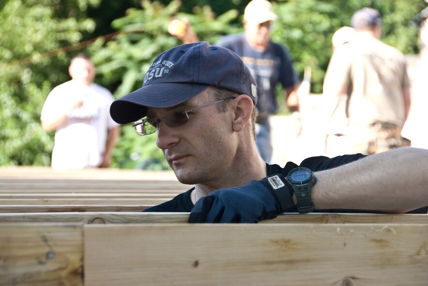 Master Sgt. Brian Jansen volunteers during a house construction project on July 18, for the Habitat for Humanity project in St. Joseph.  (U.S. Air Force photo by Master Sgt. Shannon Bond) (RELEASED)
