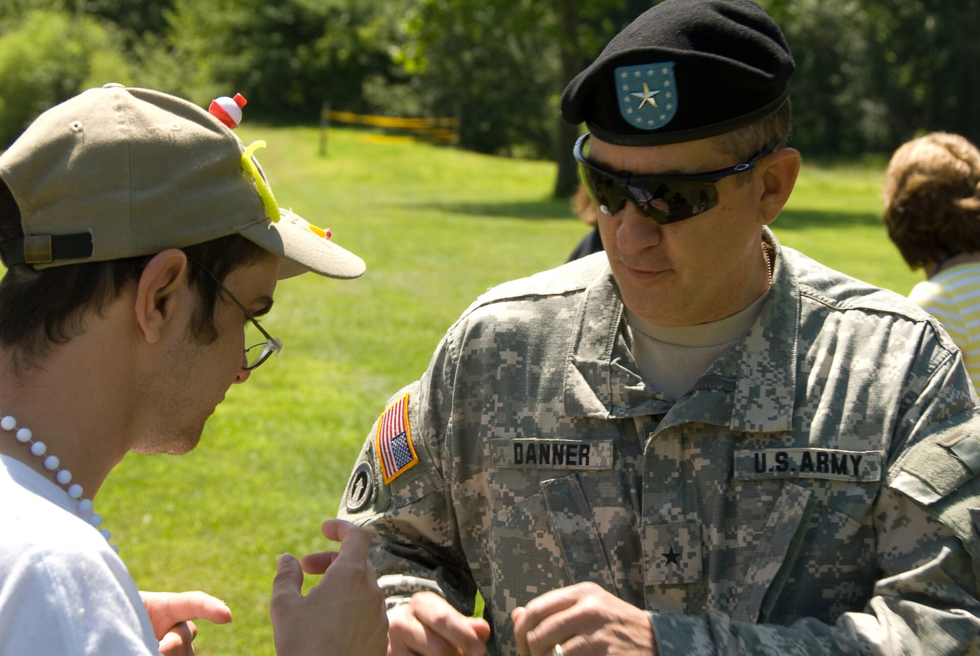 Brig. General Stephen Danner, Missouri Adjutant General, visits with campers at Camp Guardian during the 2009 session.