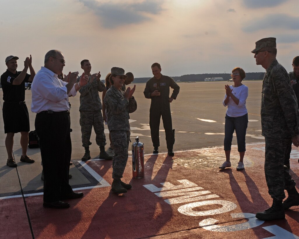 LANGLEY AIR FORCE BASE, Va. -- Gen. John D. W. Corley, Air Combat
Command commander, is applauded by friends and family after his impromptu
Fini-Flight Aug. 7. General Corley has served in the Air Force for more than
36 years and will retire Nov. 1, with over 3,000 flying hours. (U.S. Air
Force photo/Airman Rebecca Montez)