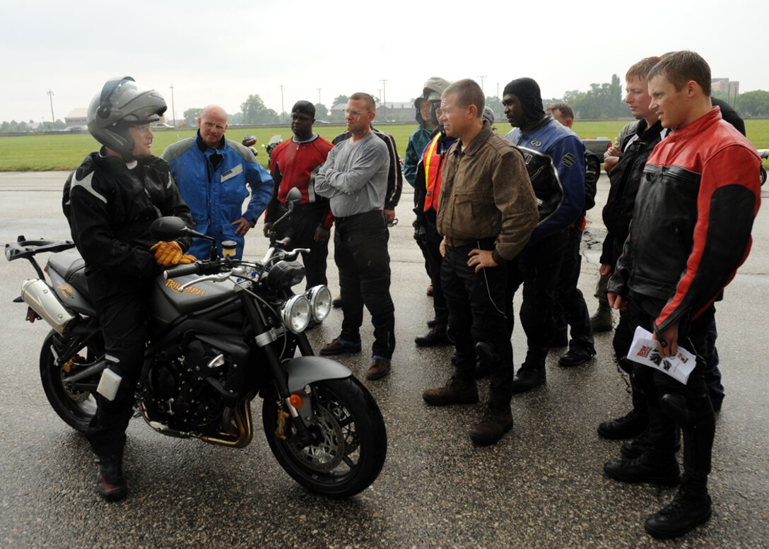 LANGLEY AIR FORCE BASE, Va. -- Lee Parks, Total Control Advanced Riding Clinic chief instructor, discusses proper motorcycle turning procedures with his class here Aug. 7. Mr. Parks runs the Total Control Advanced Riding Clinic to teach riders how to keep control of their vehicle even in the worst of circumstances. (U.S. Air Force photo/Airman 1st Class Jonathan Koob)