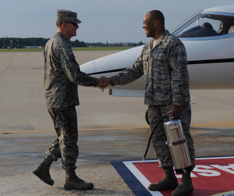 LANGLEY AIR FORCE BASE, Va. -- Gen. John D. W. Corley, Air Combat
Command commander, shakes hands with Col. Michael E. Phelps, Headquarters
ACC comptroller, after being hosed down by friends and family at his
impromptu Fini-Flight Aug. 7. General Corley has served in the Air Force for
more than 36 years and will retire Nov. 1, with over 3,000 flying hours.
(U.S. Air Force photo/Airman Rebecca Montez)
