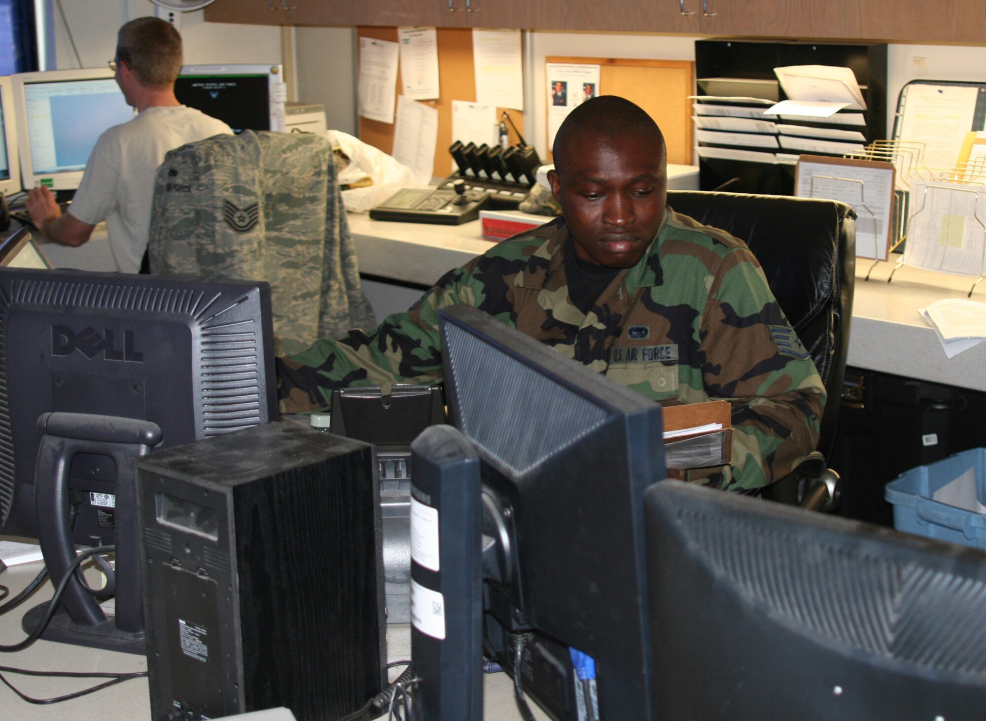 WRIGHT-PATTERSON AIR FORCE BASE, Ohio – Staff Sgt. William Smith, 87th Aerial Port Squadron, uses his computer to track incoming and outgoing cargo.  Sergeant Smith and 26 reservists with the 87th APS deployed to Hickam Air Force Base, Hawaii, for their annual tour July 25 to Aug. 8. (U. S. Air Force photo/Senior Airman Robert Nelson)