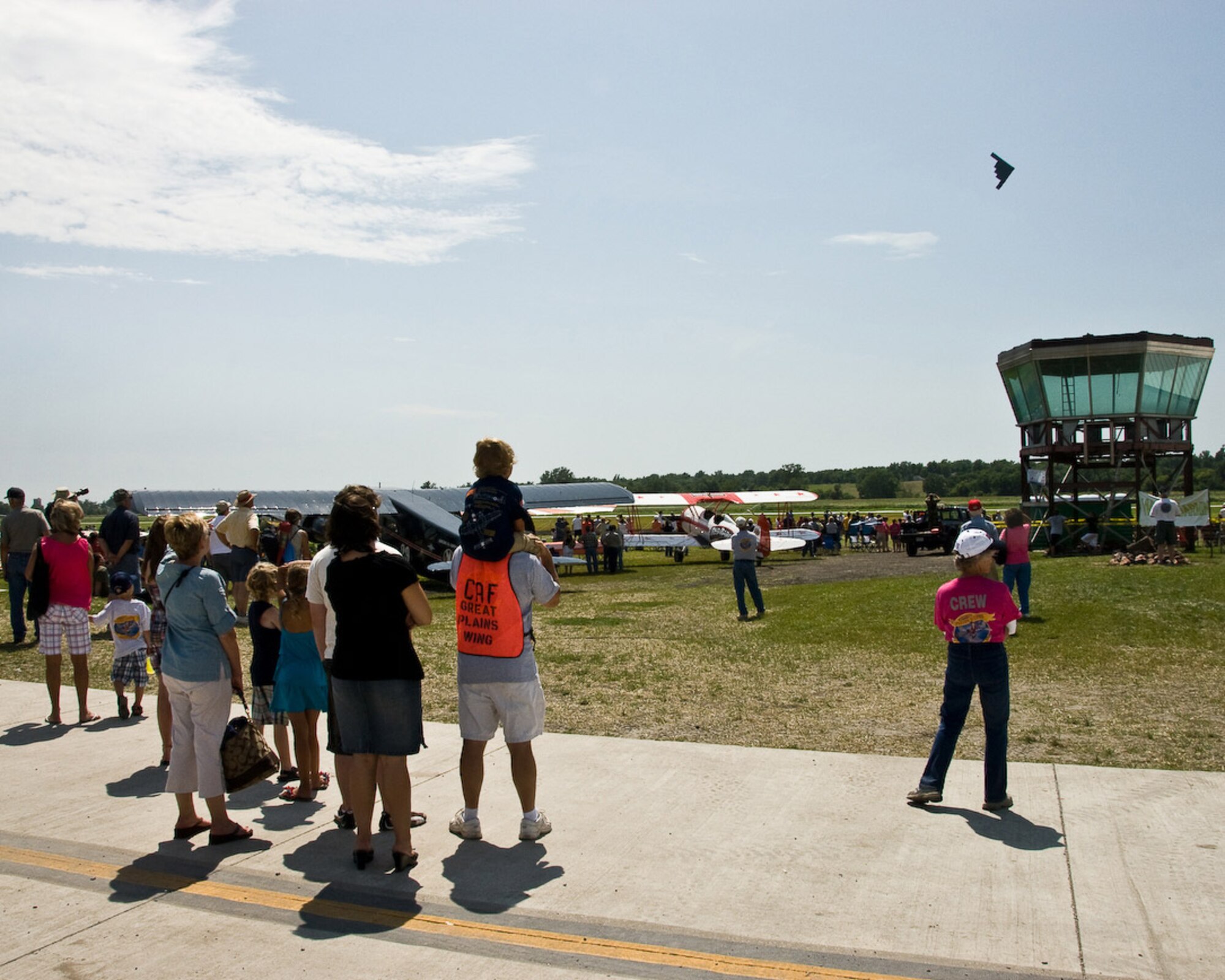 Members of the 139th Airlift Wing participate in the Wing Nuts air show in Tarkio Missouri on July 11, 2009. The air show is an annual event in which the 139th participates in for training purposes and community relations. (U.S. Air Force photo by Master Sgt. Shannon Bond) 
