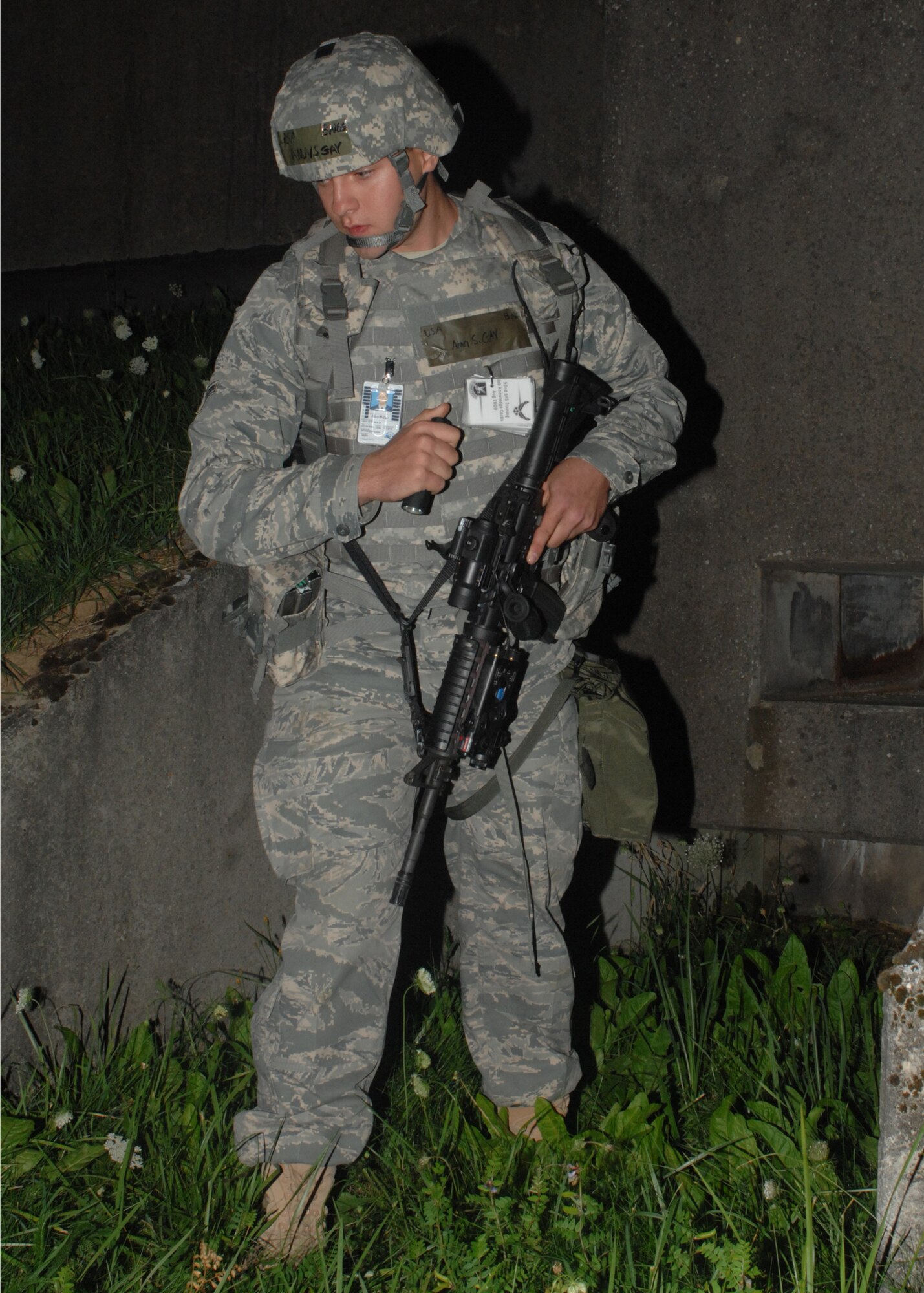SPANGDAHLEM AIR BASE, Germany -- Airman Steven Gay, 52nd Security Forces Squadron, performs a building sweep around Hardened Aircraft Shelter 22 Aug. 4 during the 52nd Fighter Wing’s Phase II exercise. Airmen were able to practice responding to multiple scenarios including mortars attacks, entry control procedures and chemical attack procedures to prepare for the June 2010 NATO Tactical Evaluation. (U.S. Air Force photo/Senior Airman Jenifer H. Calhoun)