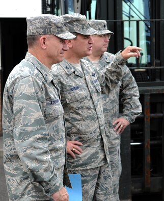 RAF MILDENHALL, England -- Col. Lewis Jordan, 352nd Special Operations Group commander (center), describes plans for future improvements to the 352nd SOG Aircraft Maintenance Unit complex to Brig. Gen. Mark Atkinson, U.S. Air Forces in Europe director of logistics, installations and mission support, Aug. 6. General Atkinson visited here for a site visit and to see base operations. (U.S. Air Force photo by Senior Airman Thomas Trower)