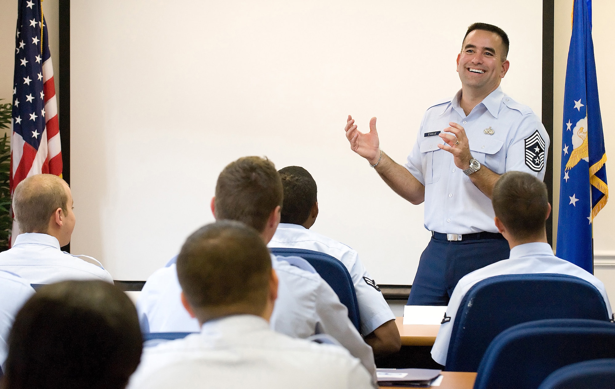 Chief Master Sgt. John Evalle, 436th Airlift Wing command chief, speaks to a First Tearm Airman Center class for the first time Aug. 3. The chief gave advice on career advancement to the new Airmen. (U.S. Air Force photo/Jason Minto)