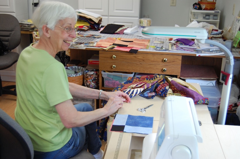 Helen Ruiz, a quilt topper from Dover, Delaware, works at her sewing machine in her home studio on June 19, 2009. Ruiz, a quilter for over 50 years, has created several custom quilts for the Quilts of Valor Foundation. (U.S. Air Force photo/Tech. Sgt. Benjamin Matwey)