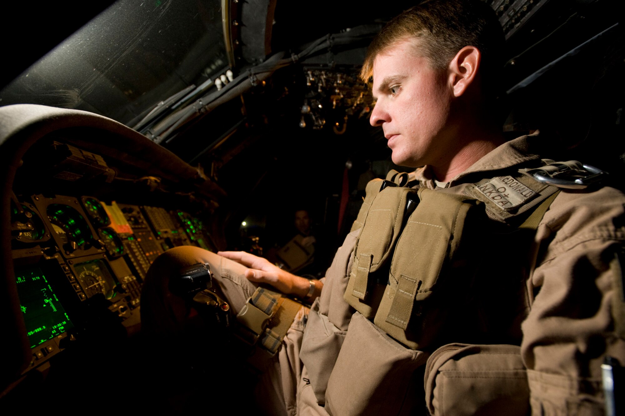 KHANDAHAR AIR FIELD, Afghanistan - First Lt. Brough McDonald (now Captain) pre-flights an HH-60 Pave Hawk helicopter before he and his crew begins their shift on alert while deployed here in August 2008. Captain McDonald is a rescue pilot at the 943rd Rescue Group, an Air Force Reserve unit at Davis-Monthan Air Force Base, Tuscon, Ariz. He and his crew were recently awarded the Thomas E. Marchbanks Award for heroism during a harrowing battlefield medical evacuation mission they performed during this deployment which resulted in rescuing soldiers and crippling the enemy. (U.S. Air Force photo/Master Sgt. Keith Brown)