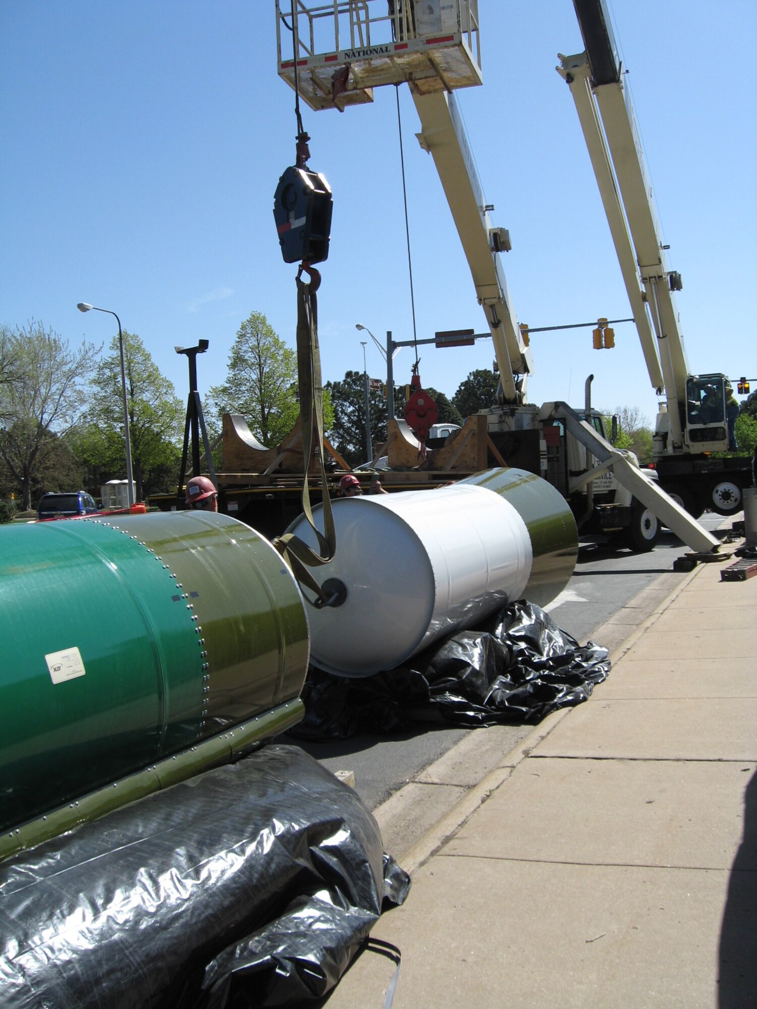 The Minuteman III ICBM arrived at Peterson on flatbed trucks in three sections May 13. Each section was lifted by crane and installed on the display site near the North Gate at the corner of Peterson Boulevard and Otis Street. Assembly took the 21st Civil Engineer Squadron three days to construct. (U.S. Air Force photo by Gail Whalen)