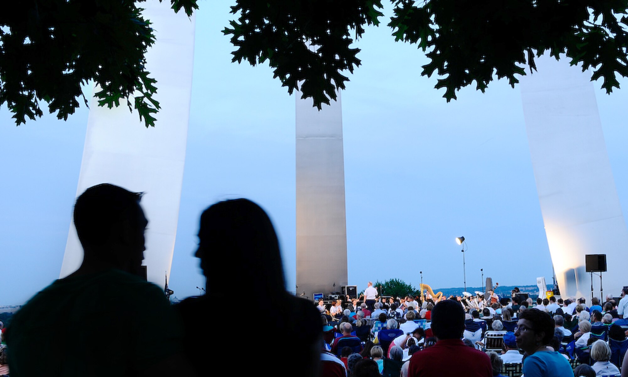 The United States Air Force Band performs at the Air Force Memorial Aug. 7 in Arlington, Va. as part of their Summer Concert Series. The Air Force Band performs at the Air Force Memorial Wednesdays and Fridays as part of their Summer Concert Series, with no fee for attendance. Musical pieces from “The Wizard of OZ” and “Annie” were performed. Every military branch’s song was played by the Band to honor all past and present military members. (U.S Air Force photo by Senior Airman Alexandre Montes)