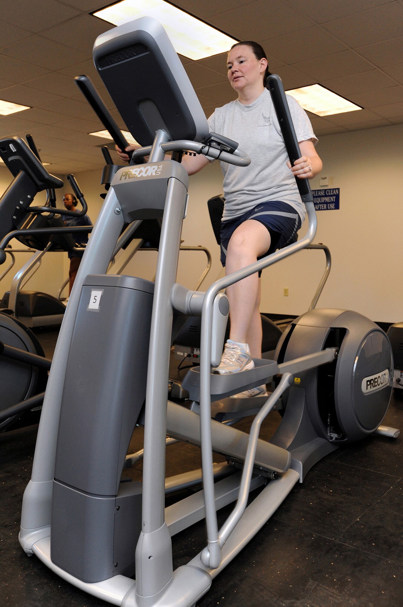 BUCKLEY AIR FORCE BASE, Colo. - Airman 1st Class Lori Case, 566th
Intelligence Squadron, works out on an elliptical trainer at the Fitness
Center here Aug. 5. The 460th Force Support Squadron recently ordered
five new ellipticals as well as other cardio equipment. (U.S. Air Force photo
by Senior Airman John Easterling)