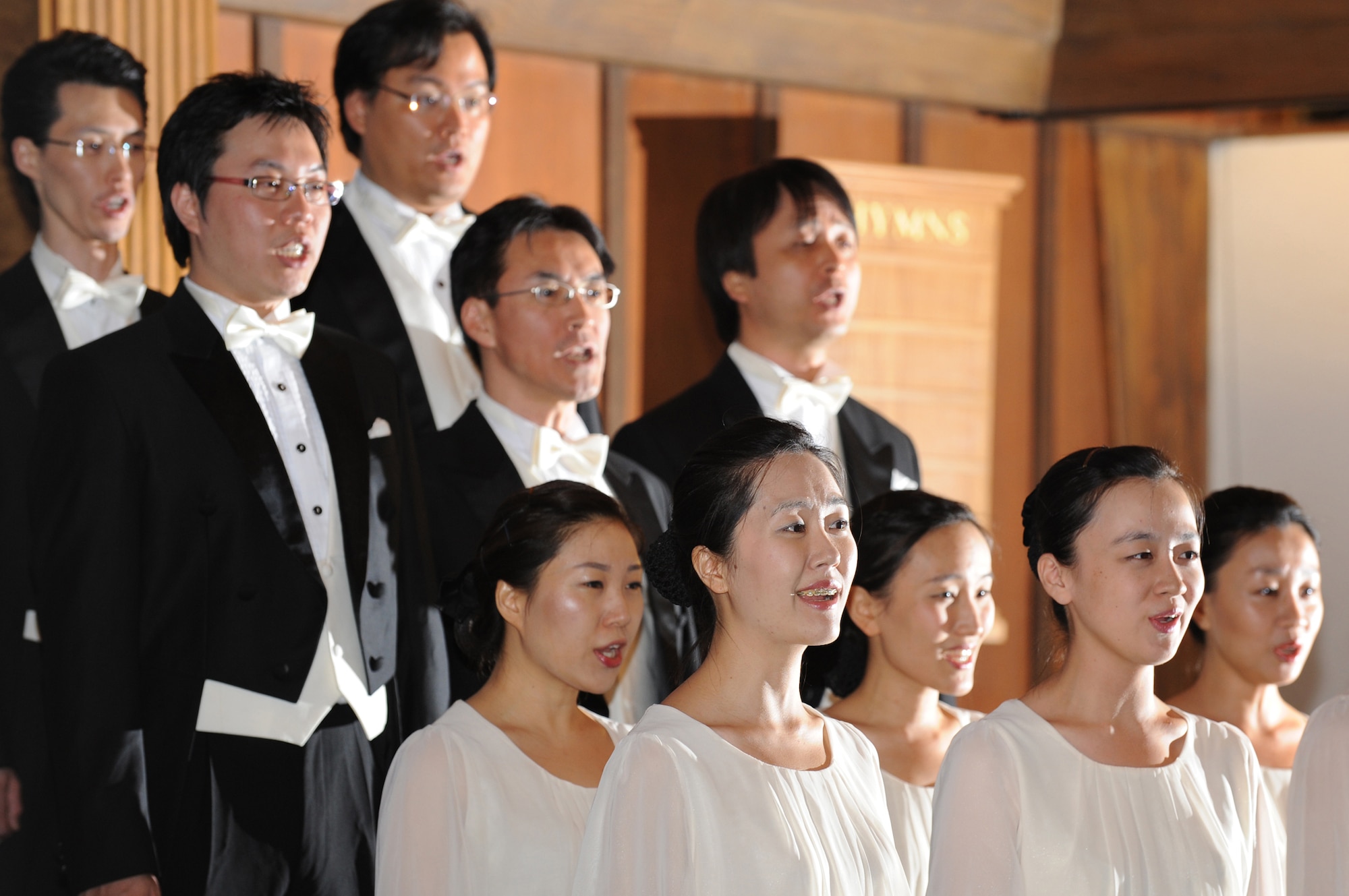 NELLIS AIR FORCE BASE, Nev. - The Chai Hoon-Cha Choir performs for Nellis Airmen, family and friends at the base chapel, Aug. 10.The Chai Hoon-Cha Choir is an internationally recognized choir from Seoul, South Korea. Their performance included seven songs, some were sang in English and others were sang in Korean. Founded in 2001, the group performed in the United States and Canada from Aug. 6 to 14.  This visit to Nellis marks a first for the famed choir.  (U.S. Air Force  photo by Tech. Sgt. Michael R. Holzworth)