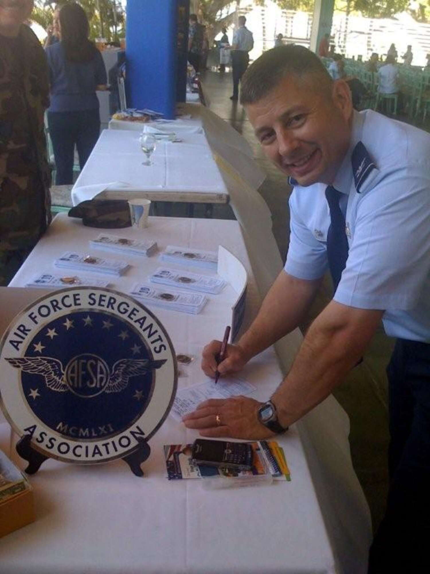 HICKAM AIR FORCE BASE, Hawaii -- Col. Rusty Baumgardner, 15th Mission Support Group commander, completes an application to become an associate member of the Air Force Sergeants Association Aug. 6. AFSA is an international organization dedicated to speaking out on behalf of all active Air Force, Reserve Components, retirees and family members to preserve and improve benefits.  Membership is open to all enlisted, officers and civilians. The Hickam AFSA Chapter 1550 will host their next meeting Aug. 25 in the Enlisted Club at 3:30 p.m.  (Courtesy photo)