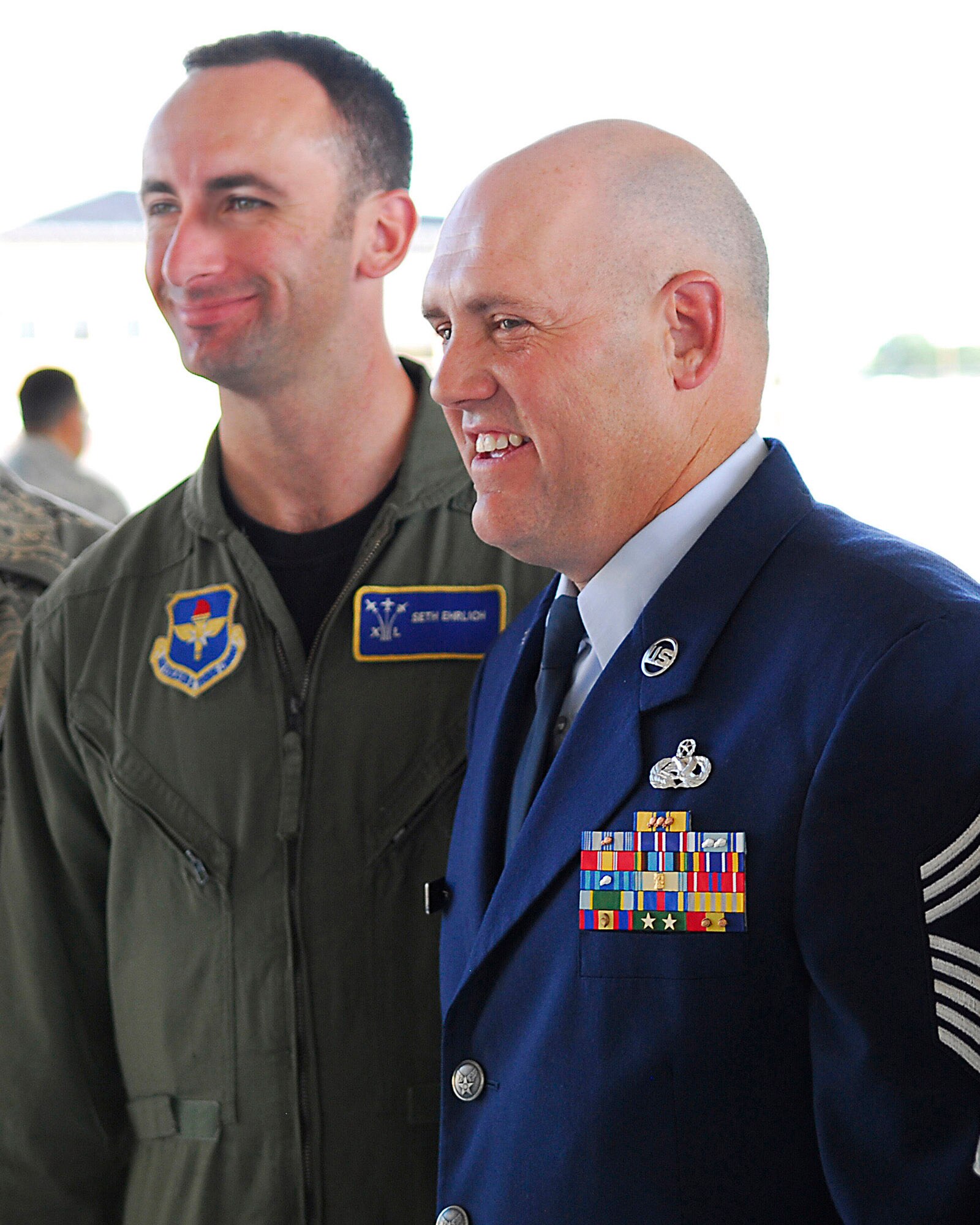 John D. Mead (right) stands along side 2nd Lt. Seth Ehrlich after being promoted to Chief Master Sergeant on August 8, 2009. A former Staff Sgt. with the Texas Air National Guard, Lt. Ehrlich worked for Chief Mead in the Aerospace Ground Equipment (AGE) flight within the 149th Fighter Wing, at Lackland Air Force Base, Texas. Ehrlich received an Air Force commission after graduating from Texas A&M University, and is currently undergoing flight training at Laughlin Air Force Base, Texas. (U.S. Air Force photo by Staff Sgt. Eric Wilson)(RELEASED)
