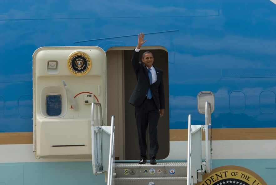 U.S. President Barack Obama waves from the door of Air Force One upon his arrival at Pease Air National Guard Base, New Hampshire August 11, 2009, before departing via motorcade to Portsmouth High School for a town-hall style meeting to talk about health care. (U.S. Air Force photo by Technical Sgt. Aaron P. Vezeau/Released)