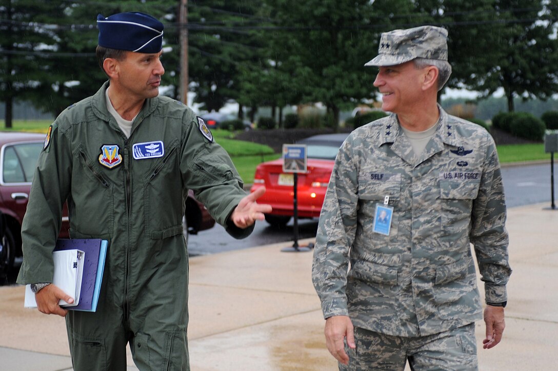 Maj. Gen. Kip Self, U.S. Air Force Expeditionary Center commander, greets Brig. Gen. Ted Kresge, U.S. Air Force Warfare Center commander, for an Expeditionary Center orientation and discussions on teaming between the two centers here Aug. 6 on the Fort Dix section of Joint Base McGuire-Dix-Lakehurst, N.J. (U.S. Air Force Photo/Staff Sgt. Nathan G. Bevier) 