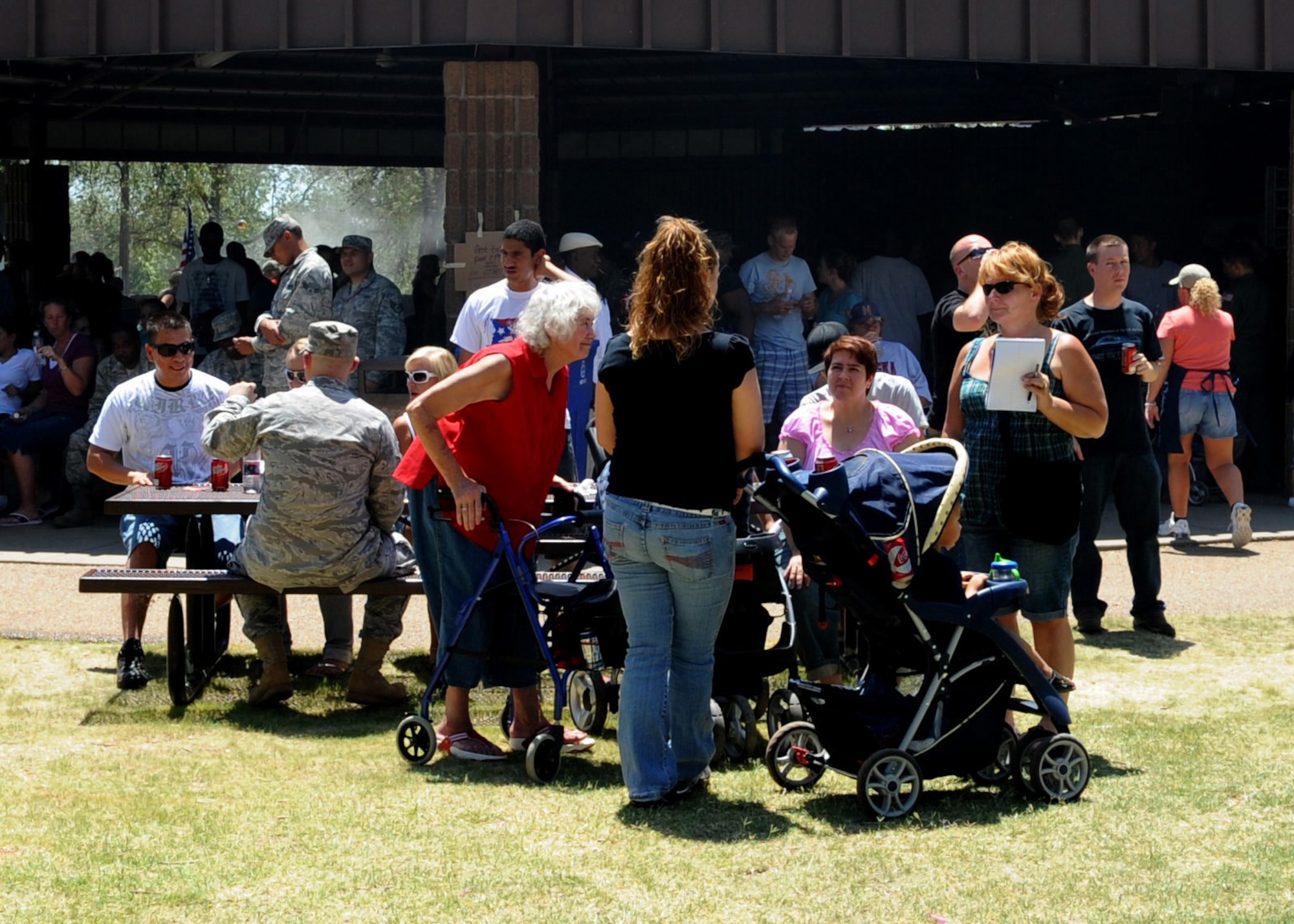 CANNON AIR FORCE BASE, N.M. --  Airman and families of the 27th Special Operations Wing enjoy the day during the raffle portion of Cannon Appreciation Day Aug. 7. The City of Clovis Chamber of Commerce and the Committee of 50 raised more than $4,000 worth of prizes in an annual show support of  Airmen, their families members and civilian workers.  (U.S. Air Force photo by Staff Sgt. Heather R. Redman) 