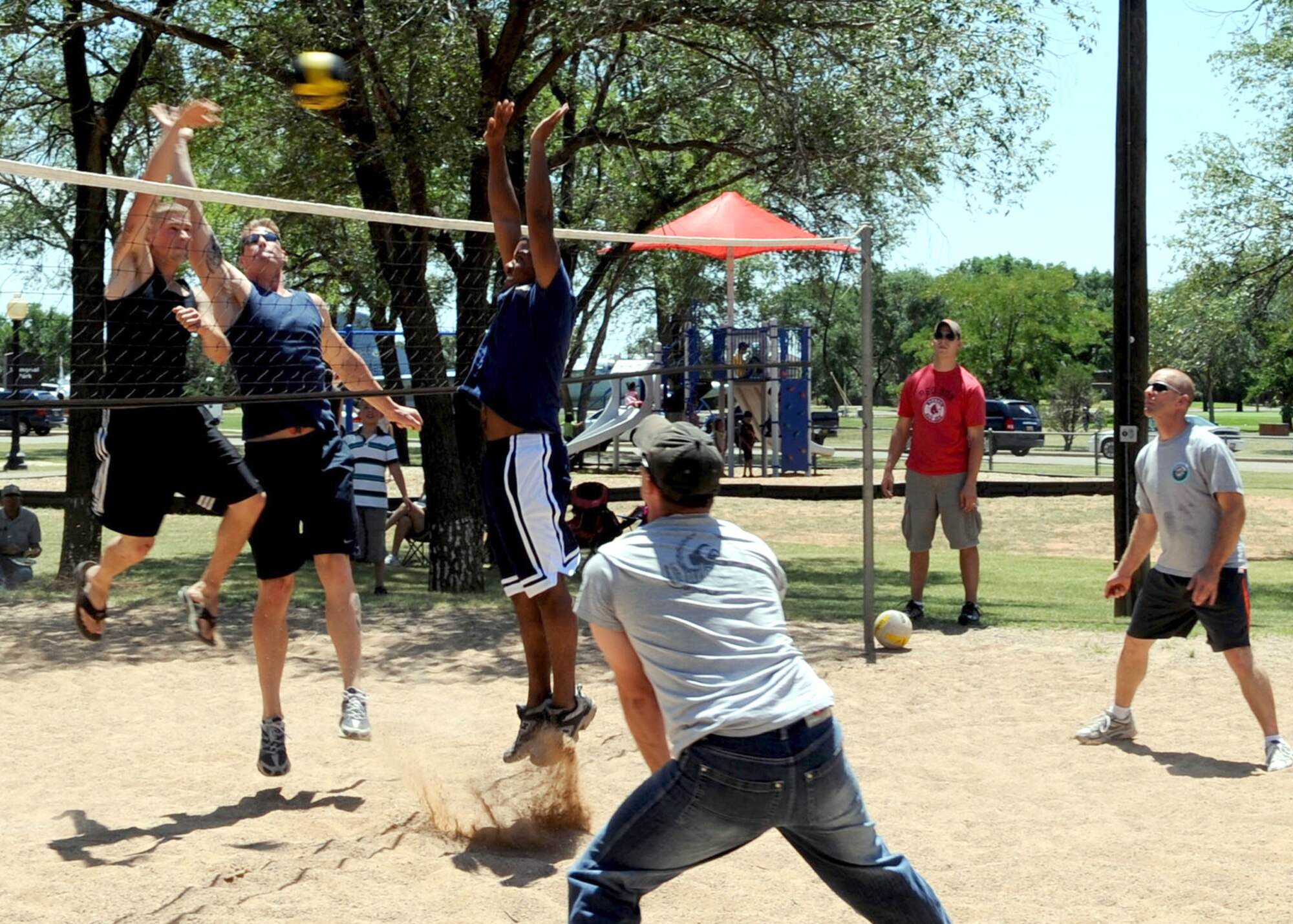 CANNON AIR FORCE BASE, N.M. -- Airmen of the 27th Special Operations Wing play volleyball during the 20th Annual Cannon Appreciation Day Aug. 7. Cannon Appreciation Day is sponsored by the City of Clovis Chamber of Commerce and the Committee of 50 to show support to the Airmen and families of the 27 SOW.  (U.S. Air Force photo by Staff Sgt. Heather R. Redman) 