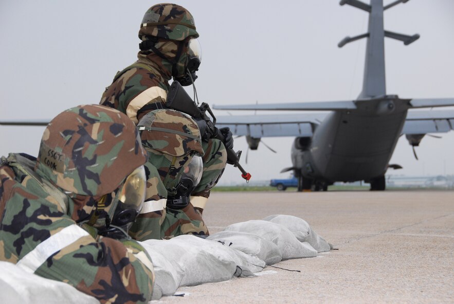 Airmen from the 193rd Special Operations Wing look on while guarding the flight line during an Operation Readiness Inspection exercise in Middletown, Pa., on May 3, 2009. Air Force photo by Staff Sgt. Mariko Rauch (released).