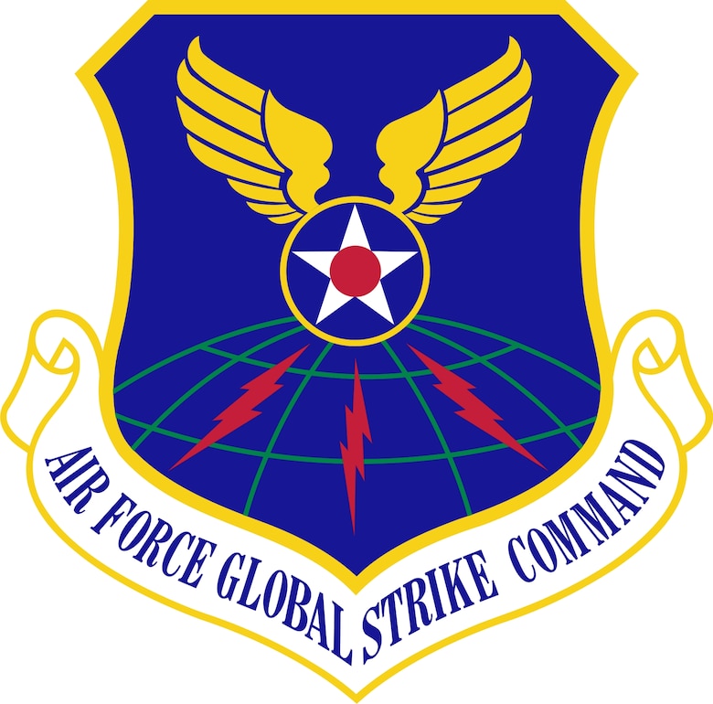The  globe reflects the command’s global capabilities. The golden wings represent the dominance in the air and reflect our lineage to the Army Air Corps strategic bombing campaigns of World War II. The blue field alludes to the sky, the primary domain of the Air Force. The Hap Arnold Star, taken from the only common elements of the 8th Air Force and 20th Air Force emblems, represents clarity of purpose to maintain readiness and deter adversaries.  The red disc symbolizes past and present Airmen who have made individual sacrifices to achieve mission goals. The lightning flashes, taken from the Strategic Air Command emblem, are symbolic of speed and power, represent our warfighting mission, should deterrence fail. 
