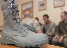 The new airman battle uniform boot sits on display while Airmen are fitted as part of the test group June 10 at Luke AFB, Ariz. (U.S. Air Force photo/Senior Airman Tracie Forte) 
