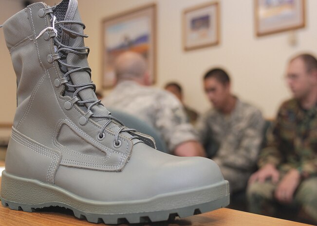 The new airman battle uniform boot sits on display while Airmen are fitted as part of the test group June 10 at Luke Air Force Base, Ariz. (U.S. Air Force photo/Senior Airman Tracie Forte)