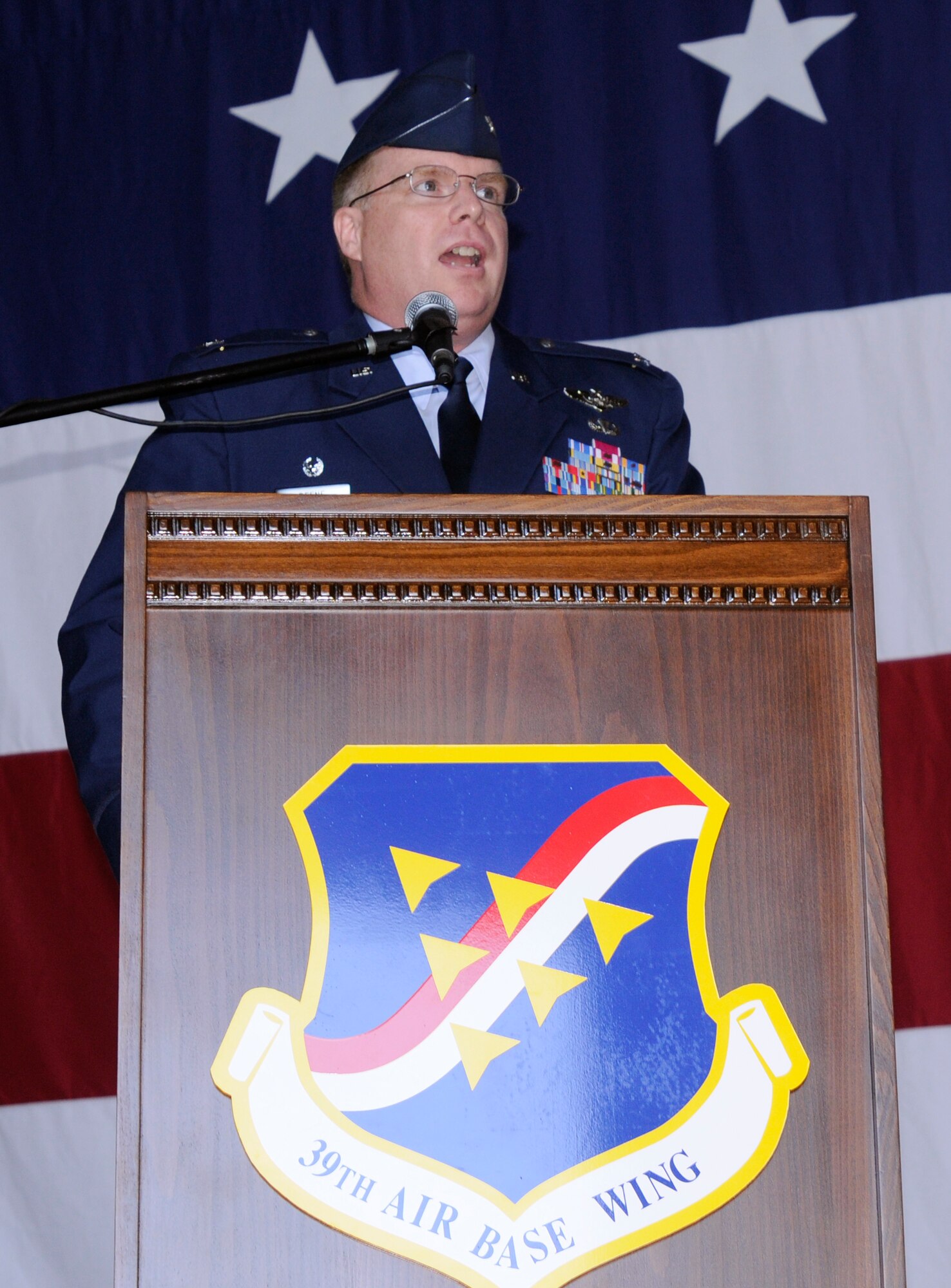 Col. Eric Beene speaks to the Airmen of 39th Air Base Wing during a change of command ceremony Tuesday, Aug. 11, 2009 in Hangar 4, Incirlik Air Base, Turkey.  Colonel Beene is the former chief of strategy of the Directorate of Strategy, Policy and Assessments at Headquarters U.S. European Command, Patch Barracks, Germany.  Colonel Beene was commissioned in 1986 from the U.S. Air Force Academy, Colorado Springs, Colo. He is a senior navigator with 1,895 flying hours in the F-111A, FB-111A, F-111E and F-15E. He has commanded at the squadron and group levels. In addition to Headquarters U.S. European Command, his previous staff tours include Headquarters U.S. Air Force and Headquarters 8th Air Force. (U.S. Air Force photo/Airman 1st Class Amber Ashcraft)