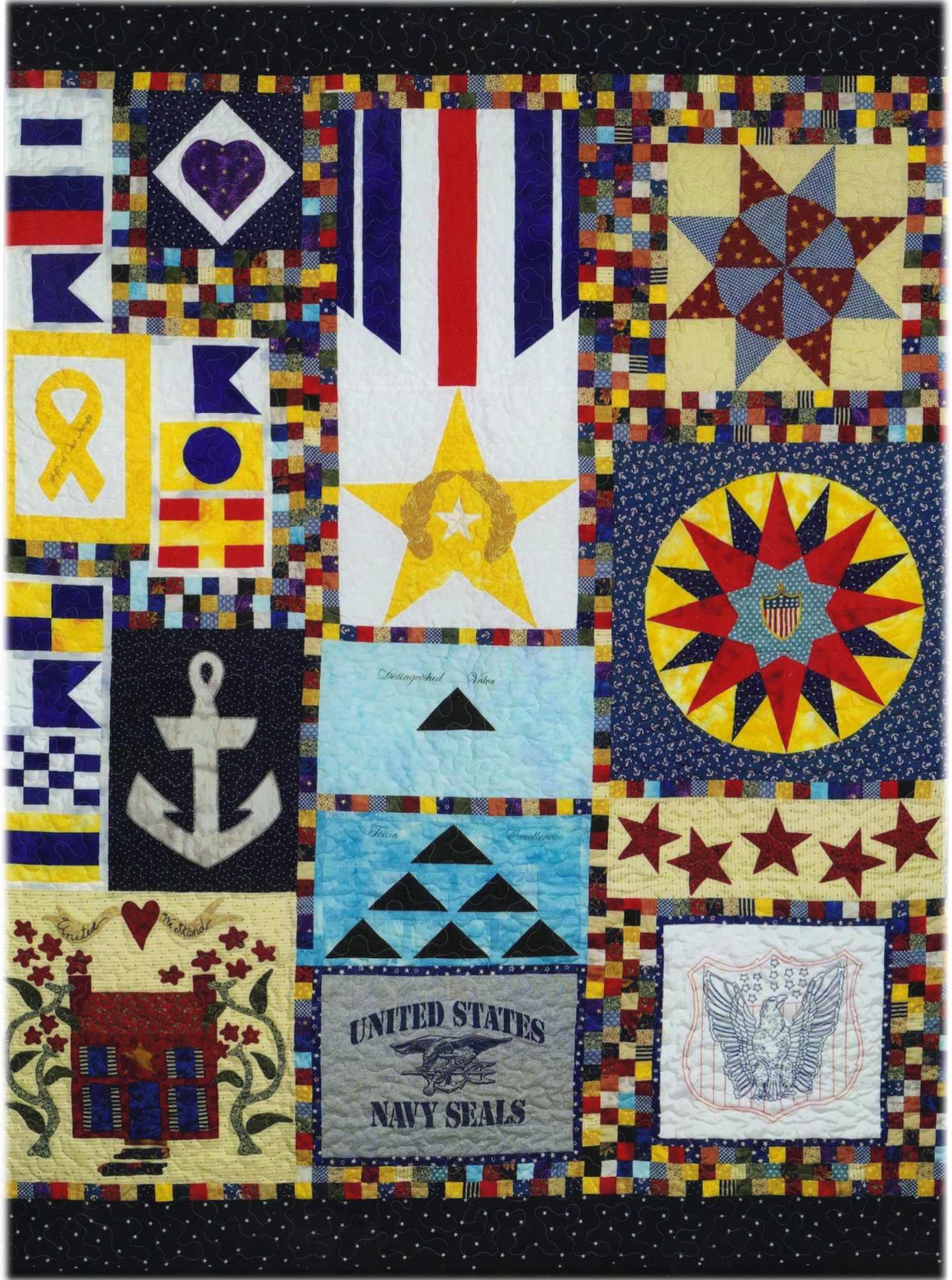 This Quilt of Valor was created over a nine-month period by quilt topper Helen Ruiz of Dover, Del., to award to a U.S. Navy Seal to give him comfort in his recovery from war wounds. (Courtesy photo/Ms. Helen Ruiz)