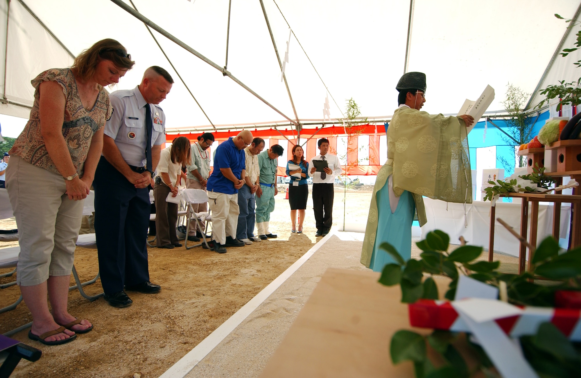 A Shinto priest gives a traditional ceremonial blessing for a safe construction project at the ground breaking of the new Erwin PME Center. The ceremony is customary for Japanese construction and for the "user" of the facility to be invited to take part in the ceremony.   (U.S. Air Force photo/Tech. Sgt. Rey Ramon) 