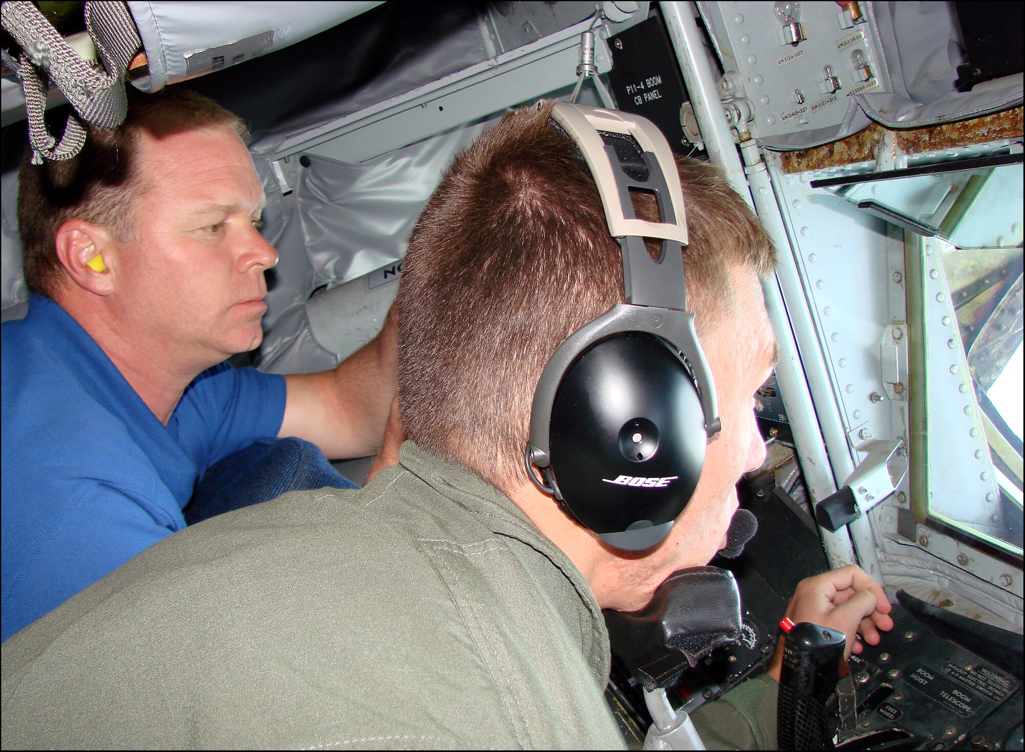 From left, Ernie Currier, Steve Barnes, Gary Young, Bob Farrell and Brad Blankenship, members of the July 23 and 24 Vance AFB Community Relations tour, listen to a U.S. Air Force Museum guide in the World War II era section of the museum, located in Wright-Patterson AFB, Ohio. The tour, which included civic, business and educational leaders from throughout northern Oklahoma, was designed to show community leaders other Air Force missions. The tour included a stop at Whiteman AFB, Mo., and an aerial refueling of a C-17 Globemaster III. (Courtesy photo)