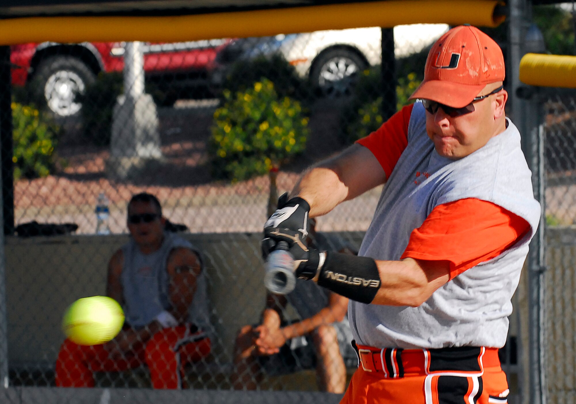 James Heller hits a grounder for Med Group One during the Intramural Softball Championship against the Retirees. Med Group One won the 2009 championship, 28-20. (U.S. Air Force photo/Rachel Boettcher)