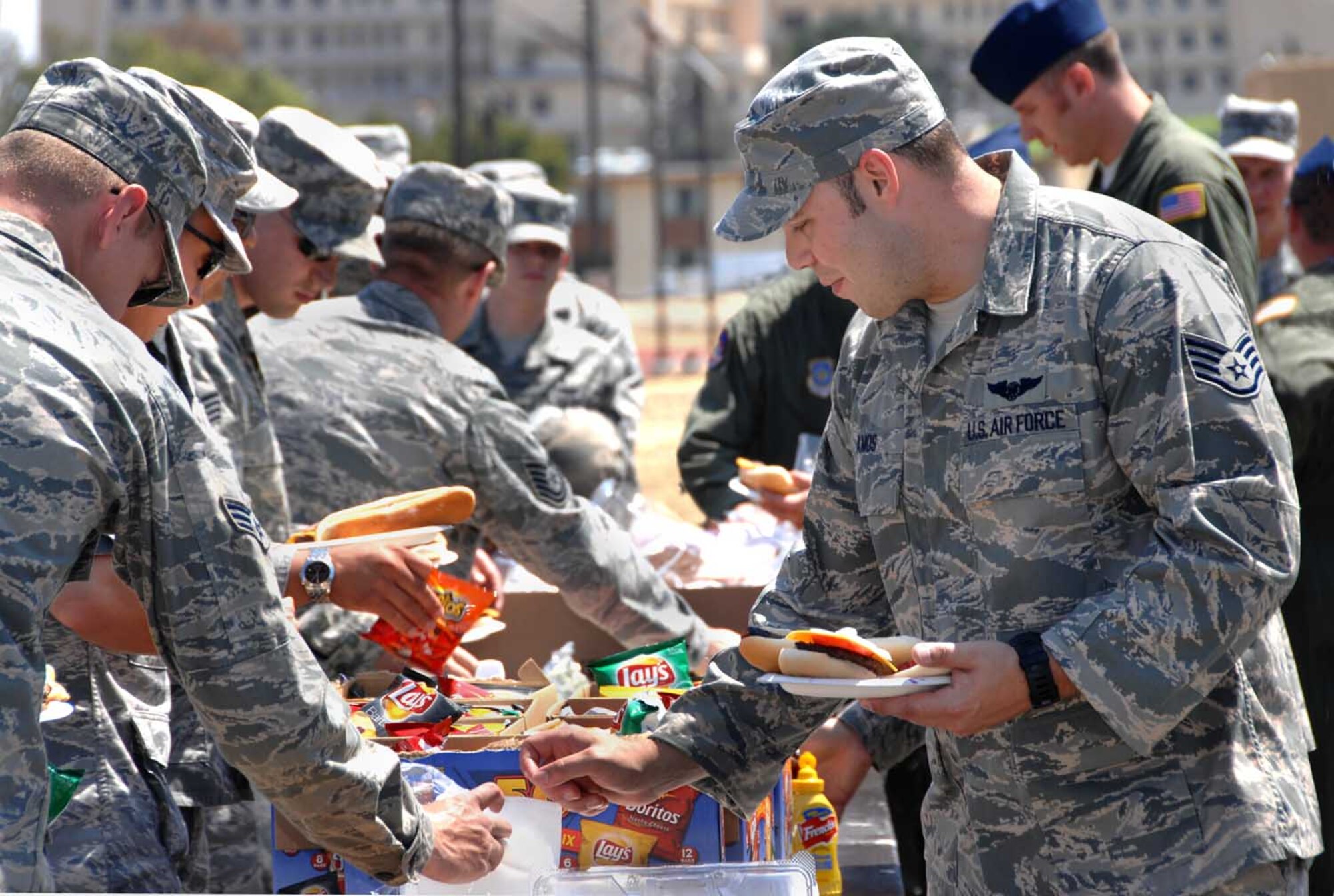 Travis members enjoy a barbecue after the Rodeo celebration Aug. 7 at the Base Theater. Travis took home 15 awards. (U.S. Air Force photo/Nan Wylie)