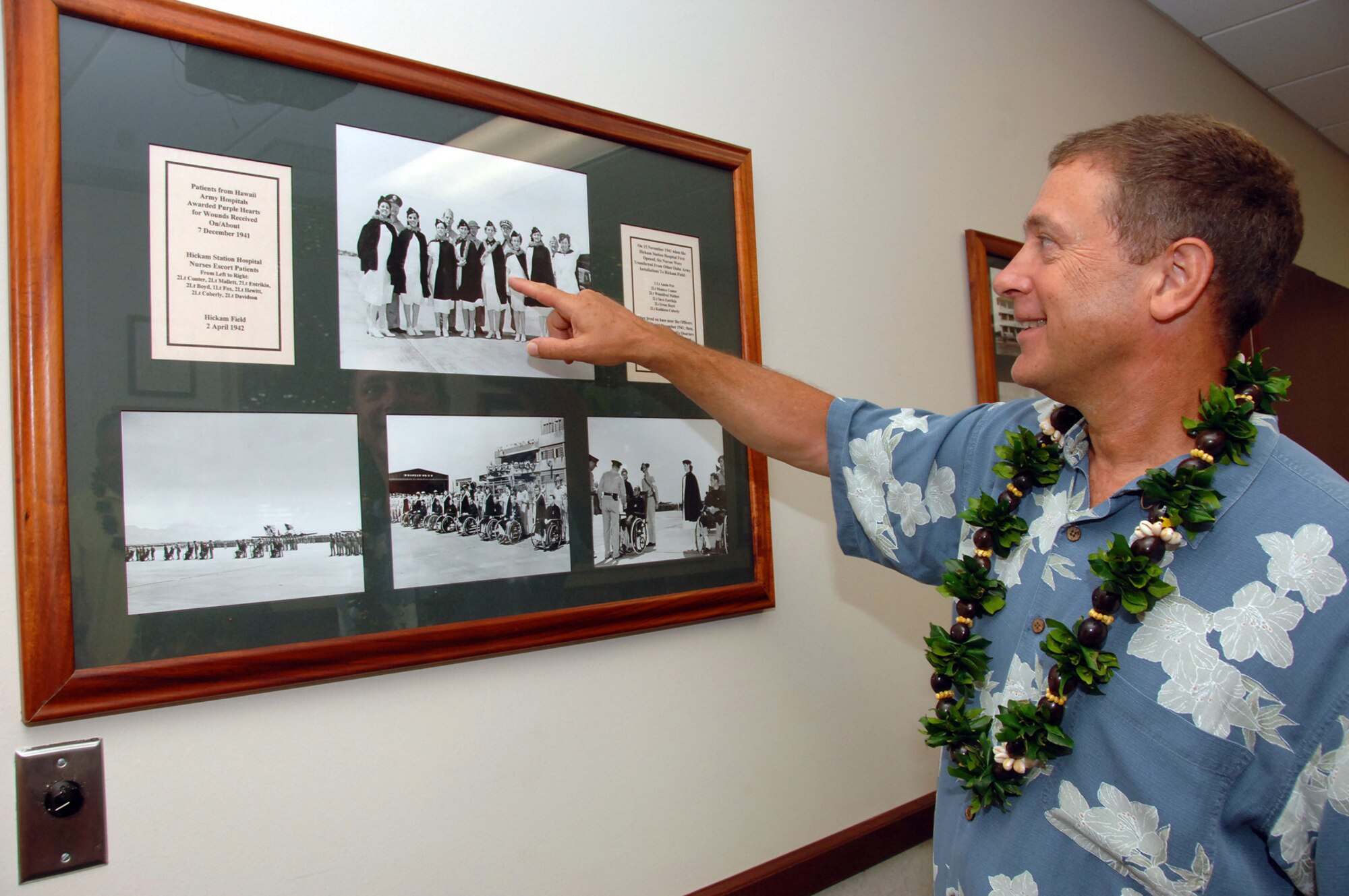 HICKAM AIR FORCE BASE, HAWAII – Charles Cornwall of Seattle, Wash., tours the 15th Medical Group conference room Aug. 11. The room is dedicated to his great-aunt, 1st Lt. Annie G. Fox, the chief nurse here during the attack on Oahu on December 7, 1941. She was the first woman and the first Army nurse to earn a Purple Heart. Lieutenant Fox was honored for her leadership, bravery, and actions during the attack. Mr. Cornwall toured the hospital and various other sites on Hickam while vacationing here in Hawaii recently. (U.S. Air Force photo/Vanessa M. Perez)
