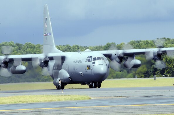 A C-130 Hercules taxies on the flight line July 31 at Robins Air Force Base, Ga. It will be the first aircraft to undergo high velocity maintenance, the new method of programmed depot maintenance aimed at reducing aircraft downtime. (U.S. Air Force photo/Sue Sapp)
