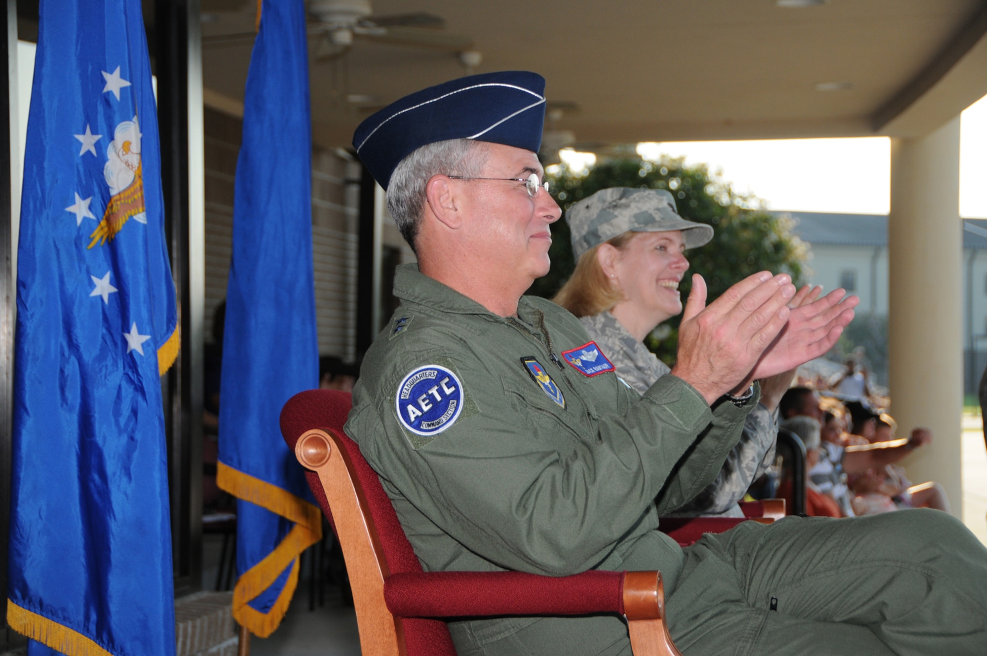 Maj. Gen. Jack Ramsaur, left, mobilization assistant to the commander of Air Education and Training Command, and Col. Lynn Connett, 81st Training Group commander, watch the drill teams perform Friday.  General Ramsaur served as reviewing officer.  (U.S. Air Force photo by Kemberly Groue)