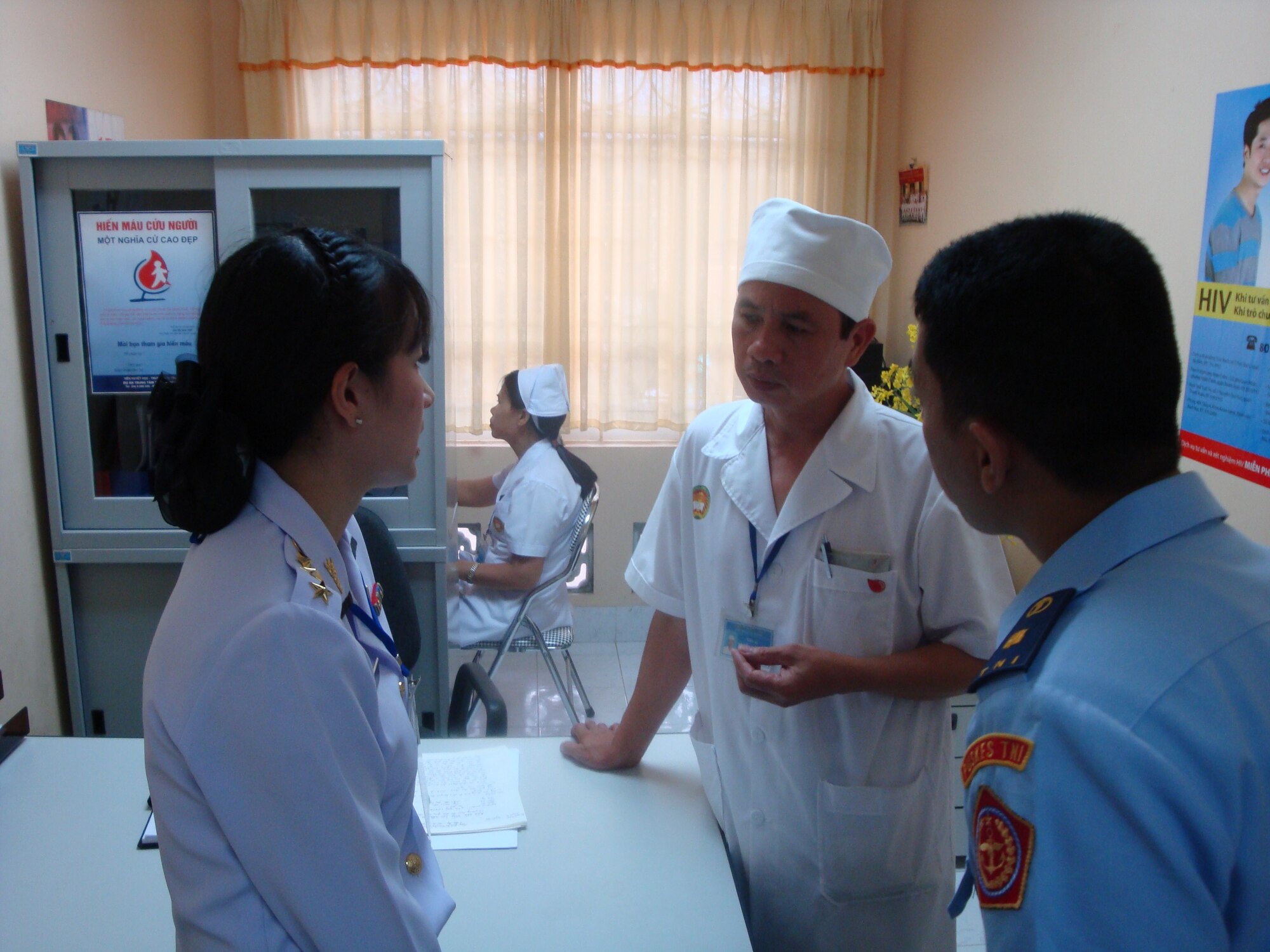 Military nurses from Indonesia, Thailand, and Vietnam discuss medical issues affecting the Asia-Pacific region during the 3rd annual Asia-Pacific Military Nursing Symposium in Hanoi, Vietnam Aug 3-7. The five-day conference, hosted by U.S. Pacific Command and the Vietnam People's Army focused on nursing education, career development, global pandemic preparedness and disaster management. The symposium, attended by more than 200 nurses from countries througout the Asia-Pacific region, was designed to help nurses in senior leadership positions share ideas and practices in order to build relations between Asia-Pacific countries. (U.S. Air Force photo/ Tech. Sgt. Carlos Limo) 