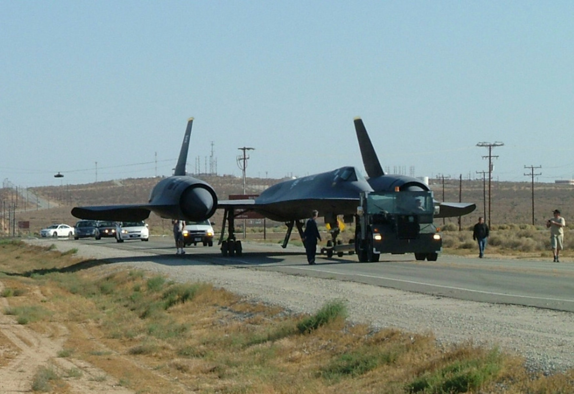 An SR-71A Blackbird is transported from the Air Force Flight Test Center Museum to the Corrosion Control Facility to be repainted Aug. 8.  This aircraft will be on display during the Flight Test Nation Air Show and Open House Oct. 17. (Air Force photo/Tech. Sgt. Trisha Winters)