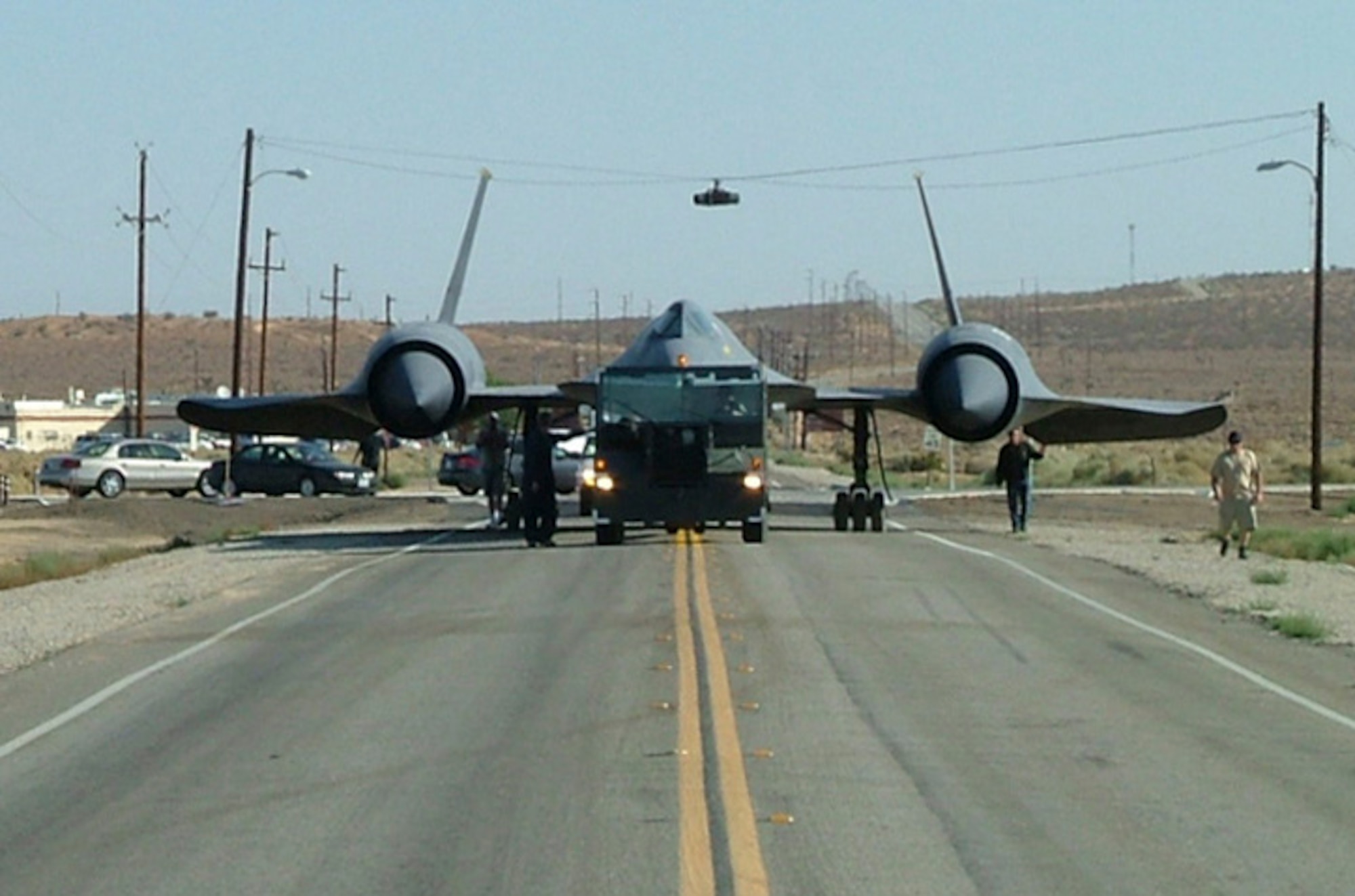 An SR-71A Blackbird is transported from the Air Force Flight Test Center Museum to the Corrosion Control Facility to be repainted Aug. 8.  This aircraft will be on display during the Flight Test Nation Air Show and Open House Oct. 17. (Air Force photo/Tech. Sgt. Trisha Winters)