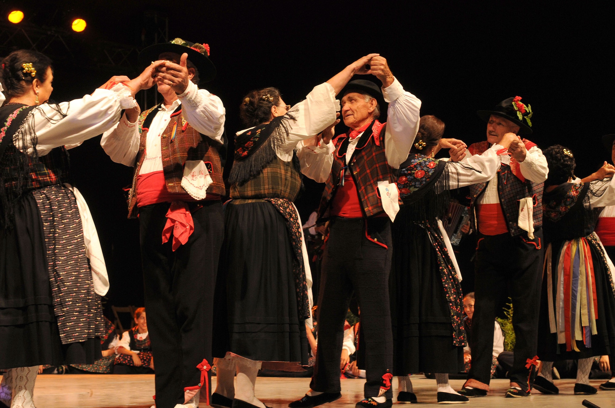 Members of the Gruppo FolKloristico ‘Federico Angelica’ Danzerini di Aviano perform during the opening night of the 41st International Folklore Festival Aviano-Piancavallo Aug. 8, 2009.  Groups from around Europe, Asia and South America also performed during the opening night in Aviano, Italy.  This year’s festival runs through Aug. 16 with evening performances held at 9 p.m.  (U.S. Air Force photo/Airman 1st Class Ashley Wood)