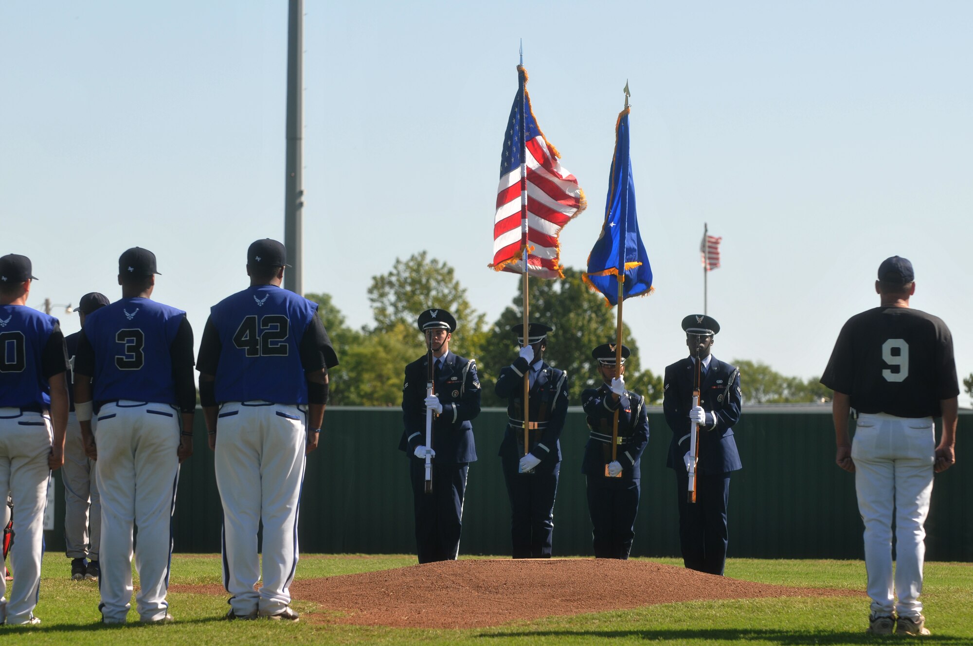 ALTUS AIR FORCE BASE, Okla. – Altus Air Force Base Blue Knights Honor Guard present the colors at the opening ceremony of the Air Force Baseball Bash Aug. 8.  The Altus Outlaws played Tinker, Davis Monthan, and Luke Air Force Base in a tournament series from Aug. 6 to 9.  (U.S. Air Force photo/Senior Airman Jennifer L. Flores)