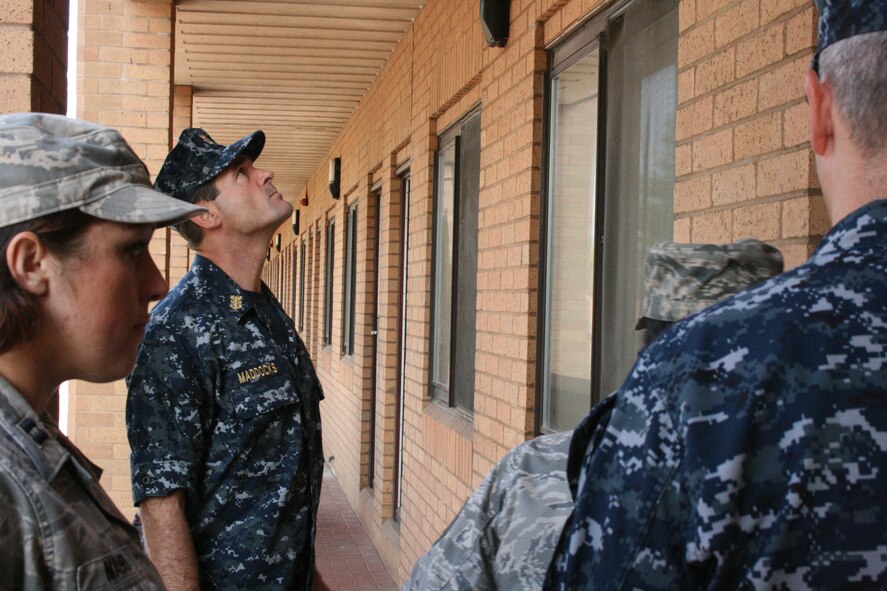 RAF ALCONBURY - Navy Fleet Master Chief Roy Maddocks, Jr. visits the enlisted dormitories here Aug. 11. His visit of wing facilities provided him an out look on what shape the facilities are in at the 501st Combat Support Wing. Fleet Master Chief Maddocks is the U.S. European Command's Senior Enlisted Leader.