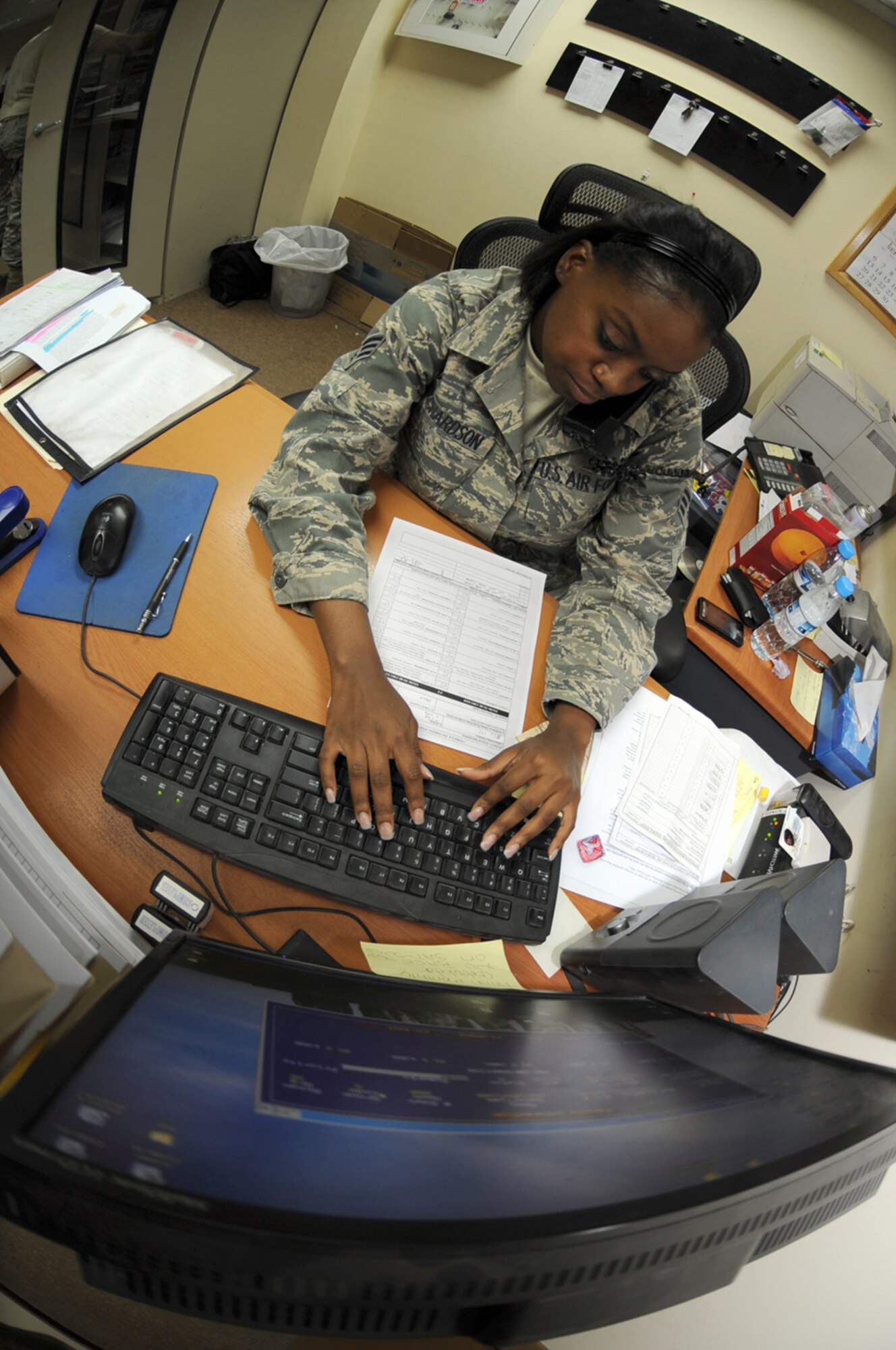 SOUTHWEST ASIA -Senior Airman Natasha Richardson, 380th Expeditionary Logistics Readiness Squadron, keeps track of vehicle status Aug 11. Airman Richardson, is a vehicle management journeyman deployed from Nellis AFB, Nev., and hails from Inglewood, Calif. (U.S. Air Force photo/Tech. Sgt. Charles Larkin Sr)