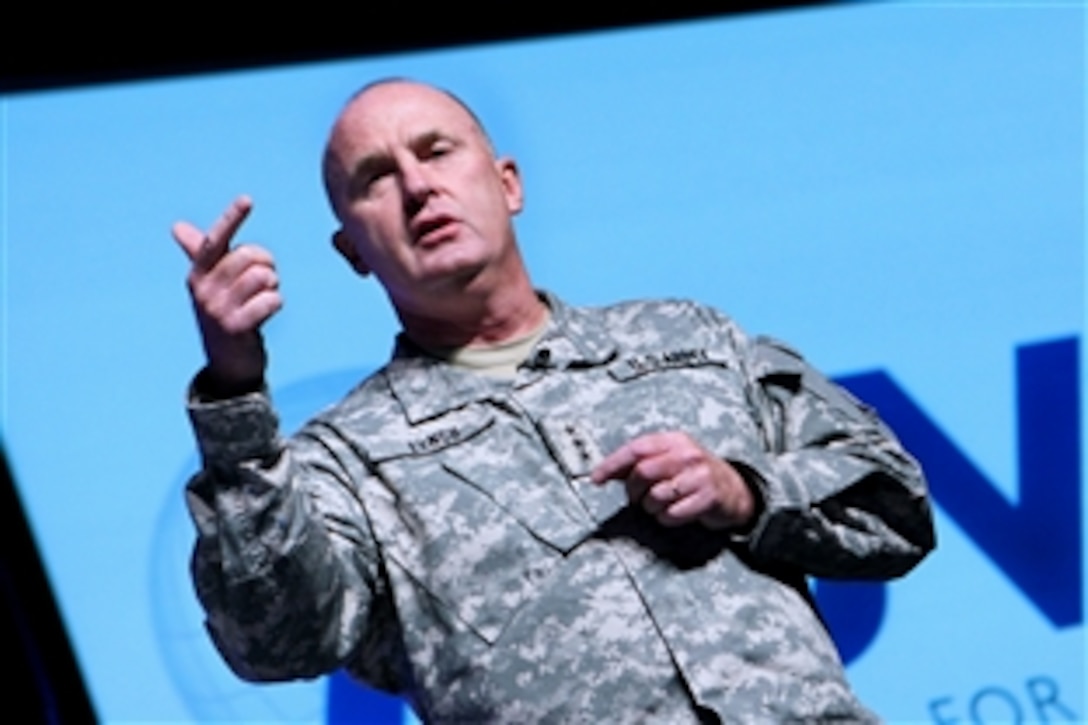 U.S. Army Lt. Gen. Rick Lynch, commanding general of the 3rd Corps and Fort Hood, Texas, addresses an audience of unmanned systems professionals during the Association for Unmanned Vehicle Systems International convention in Washington, D.C., Aug. 11, 2009.